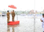 Meskipun Diguyur Hujan Upacara HKN Tetap Khidmat di Aceh Utara